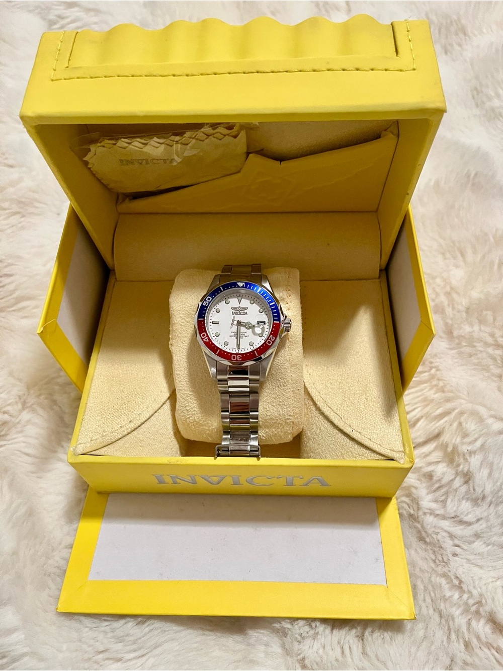 Invicta unisex Silver Watch with White Dial and Red & Blue Bezel